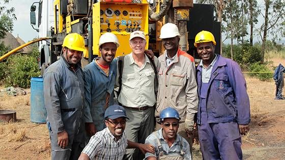 Safe Water project, Site Visit in Ethiopia, team drilling bore holes for a water well to serve the local village.