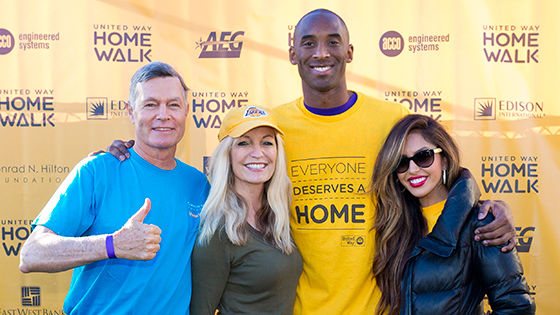 Hilton Foundation team walked a 5k taking a stand against homelessness. Image of Steven M. Hilton with Kobe and Vanessa Bryant